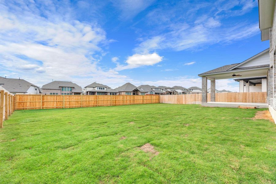 Exterior details and patio area of a home in Santa Rita Ranch - 60', Liberty Hill (Image 3).