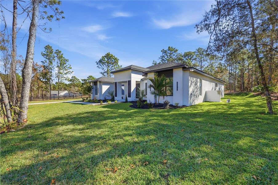 Exterior details and patio area of a home in , Wildwood (Image 29).