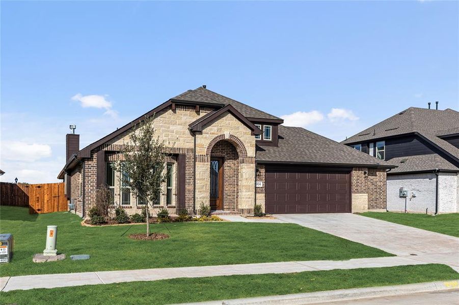 Front exterior of a new home in West Crossing, Anna, TX, highlighting curb appeal (Image 2). Front exterior of a new home in West Crossing, Anna, TX, highlighting curb appeal (Image 2).