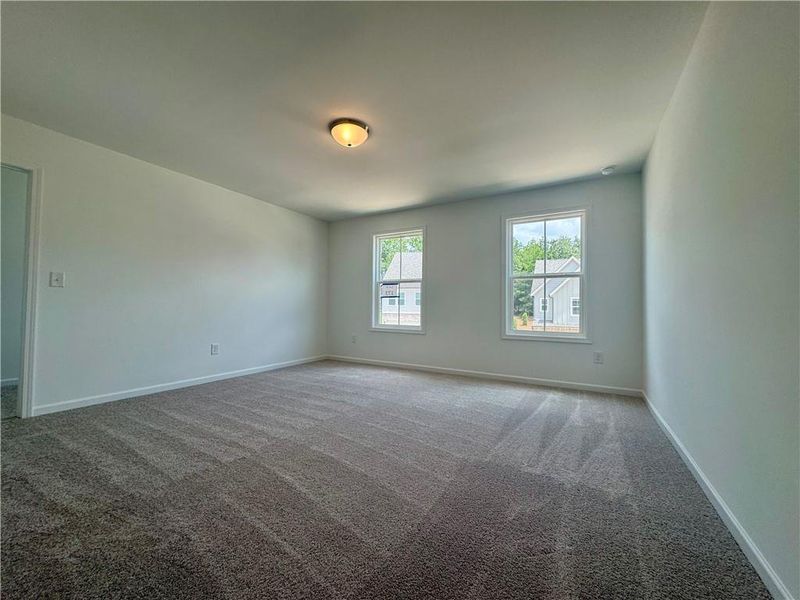 Spacious, unfurnished interior of a new home in Eastlyn Crossing - Single Family, Flowery Branch (Image 17). Spacious, unfurnished interior of a new home in Eastlyn Crossing - Single Family, Flowery Branch (Image 17).