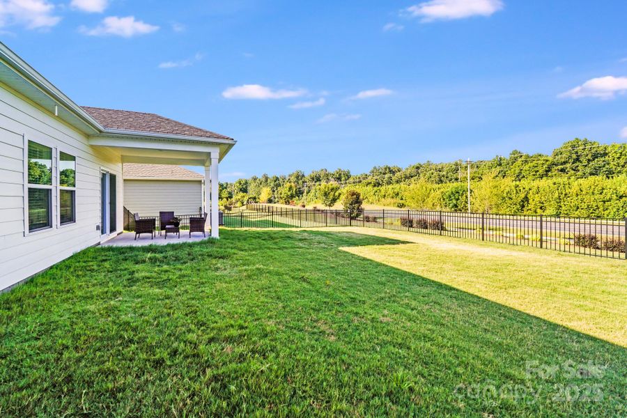 Front exterior of a new home in Simpson Farms, Monroe, NC, highlighting curb appeal (Image 19). Front exterior of a new home in Simpson Farms, Monroe, NC, highlighting curb appeal (Image 19).