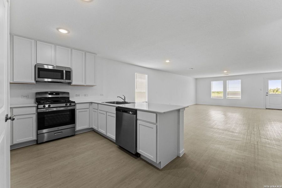 Furnished interior view inside a new home in Sky Ranch, New Braunfels (Image 6).