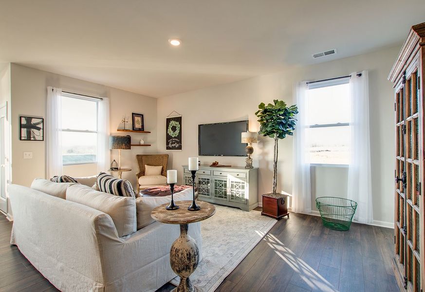Representative furnished interior of a home built from the SALEM by D.R. Horton in The Parks, White House (Image 15).
