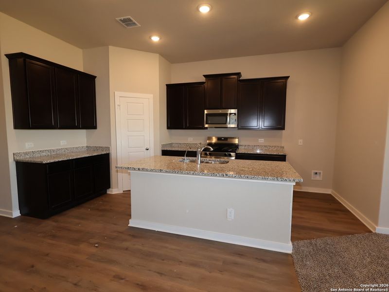 Furnished interior view inside a new home in Winding Brook, San Antonio (Image 11).