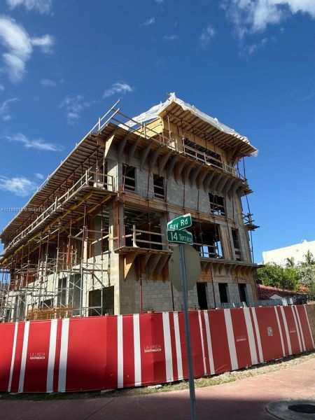 Front exterior of a new home in , Miami Beach, FL, highlighting curb appeal (Image 7).