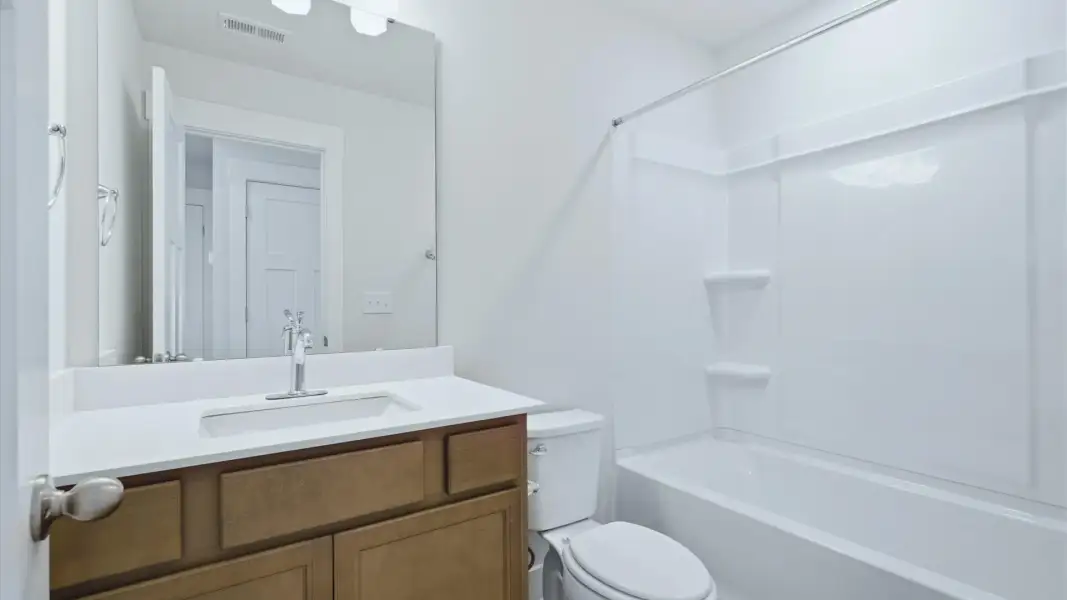 Top-notch bathroom with current fixtures, tasteful materials, and elevated charm near Downtown Anderson