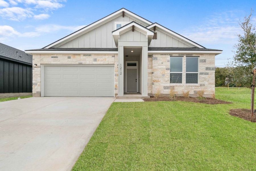 Front exterior of a new home in Oak Ridge, Temple, TX, highlighting curb appeal (Image 1). Front exterior of a new home in Oak Ridge, Temple, TX, highlighting curb appeal (Image 1).