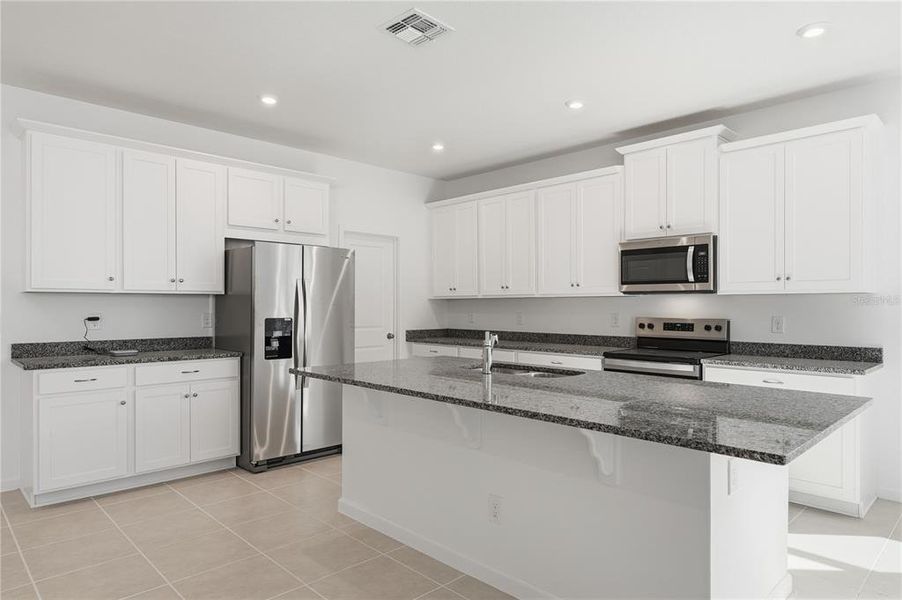 Furnished interior view inside a new home in Rainwood, Clermont (Image 9).