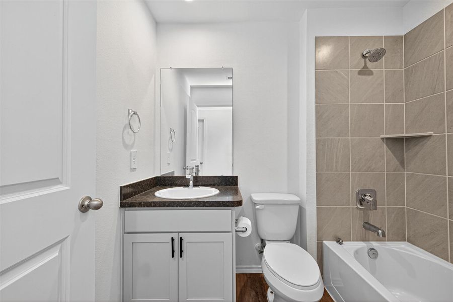 Furnished interior view inside a new home in Breckenridge Forest, Spring (Image 4).