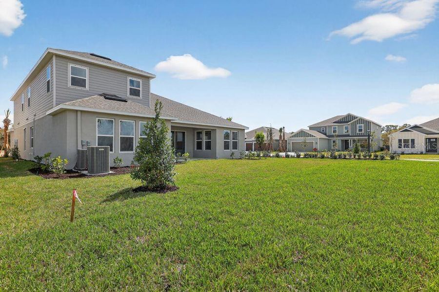 Exterior details and patio area of a home in Firethorn, Parrish (Image 3).