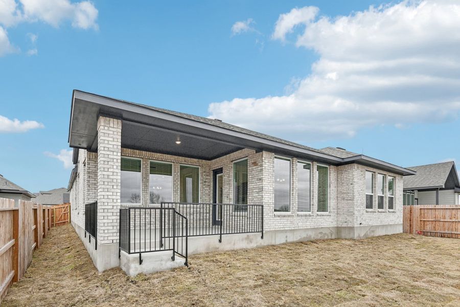 Exterior details and patio area of a home in Village at Three Oaks, Seguin (Image 28). Exterior details and patio area of a home in Village at Three Oaks, Seguin (Image 28).
