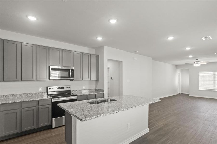 Furnished interior view inside a new home in Retreat at Fossil Creek, Fort Worth (Image 5). Furnished interior view inside a new home in Retreat at Fossil Creek, Fort Worth (Image 5).