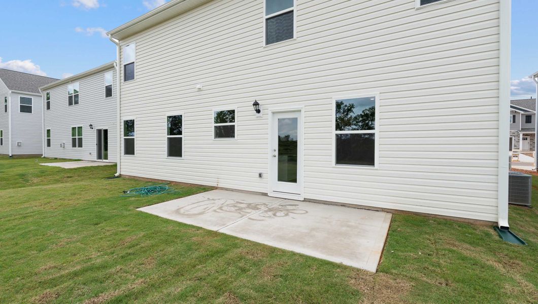 Exterior details and patio area of a home in Hunters Ridge, Woodruff (Image 4).