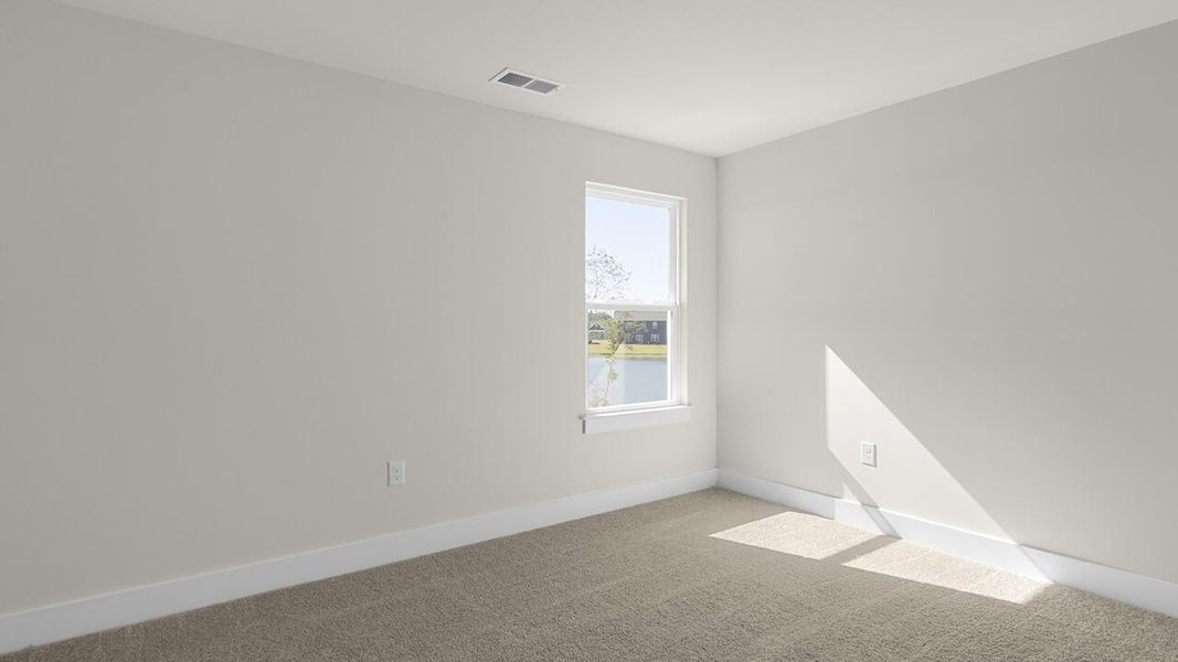 Spacious, unfurnished interior of a new home in Sidbury Station, Castle Hayne (Image 40).