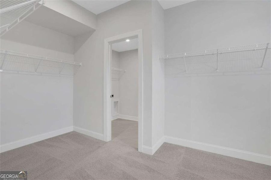 Spacious, unfurnished interior of a new home in The Paddocks at Doc Hughes, Buford (Image 43).