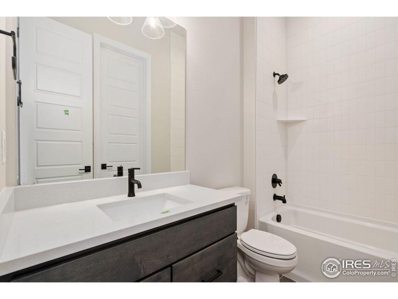 Furnished interior view inside a new home in The Fairways at RainDance, Windsor (Image 4).