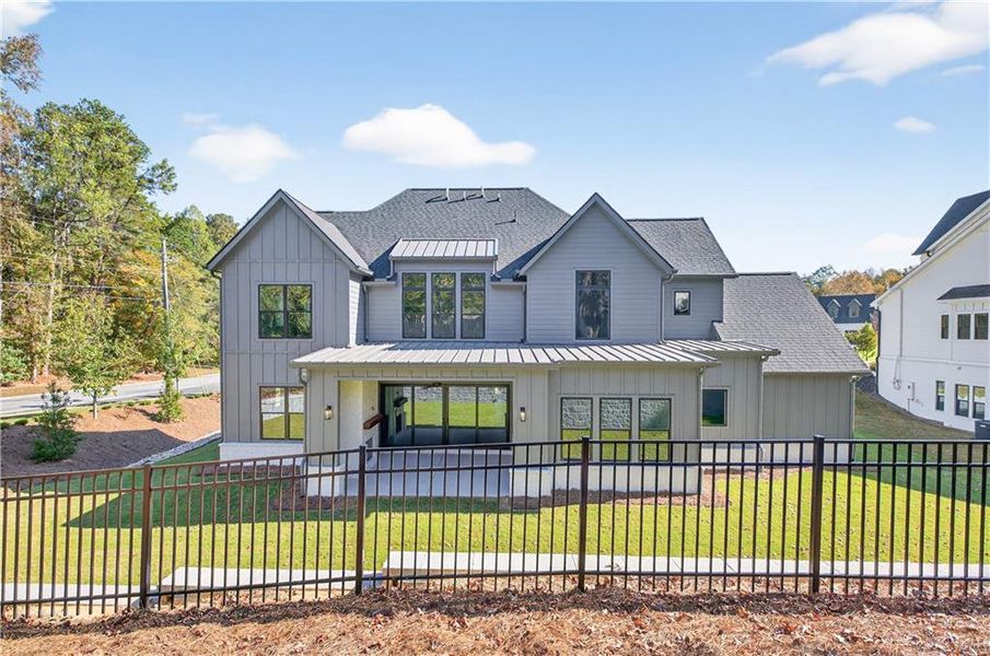Front exterior of a new home in Town Farms, Peachtree Corners, GA, highlighting curb appeal (Image 29).