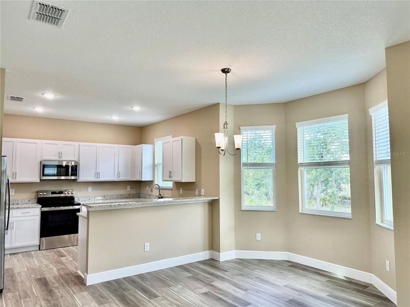 Furnished interior view inside a new home in , Weeki Wachee (Image 8).