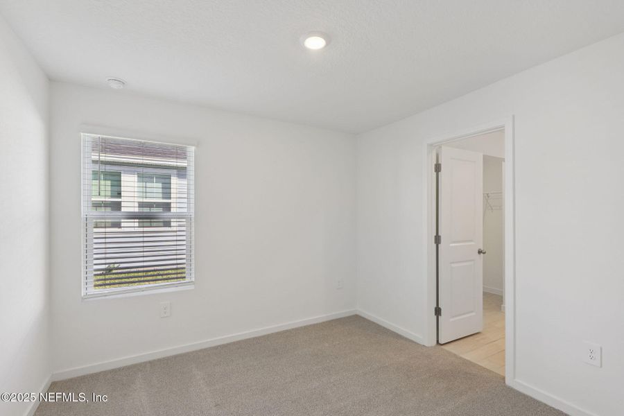 Spacious, unfurnished interior of a new home in Cypress Meadows - Signature Series, Jacksonville (Image 26).