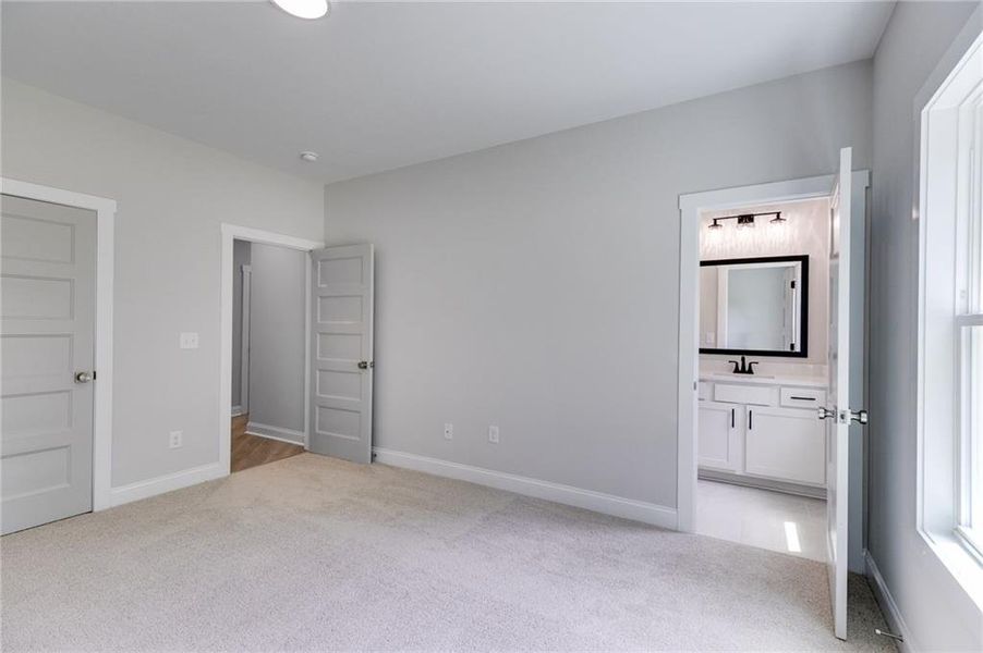 Spacious, unfurnished interior of a new home in The Meadows at Lake Circle, Buchanan (Image 40).