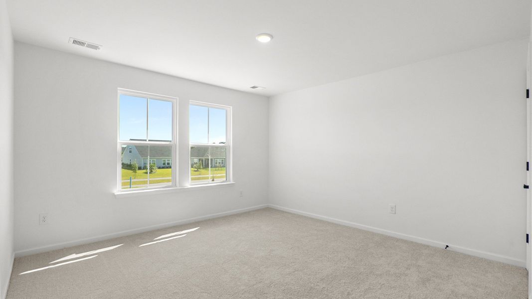 Furnished interior view inside a new home in Indigo at the Preserve, Longs (Image 17).