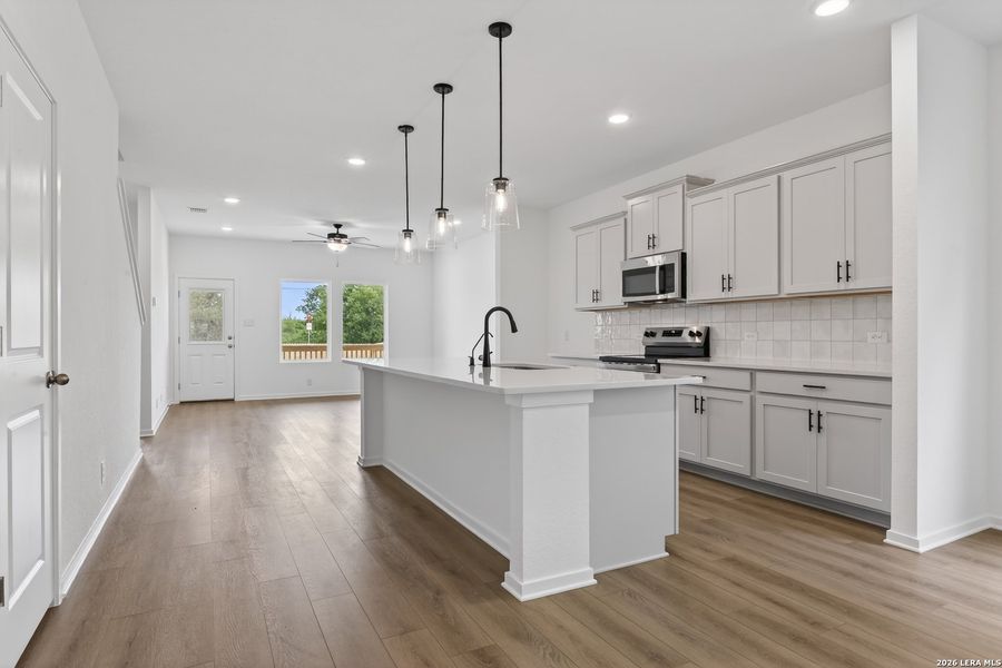 Furnished interior view inside a new home in Hennersby Hollow, San Antonio (Image 6).