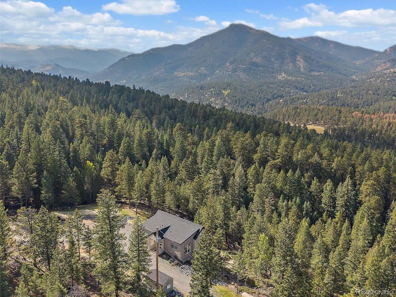 A 3.2-acre retreat in the prestigious Upper Bear Creek area.