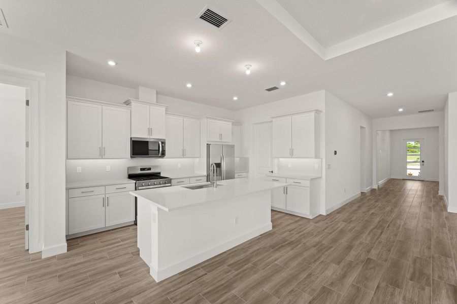 Furnished interior view inside a new home in Tradition - Seville, Port St. Lucie (Image 7). Furnished interior view inside a new home in Tradition - Seville, Port St. Lucie (Image 7).