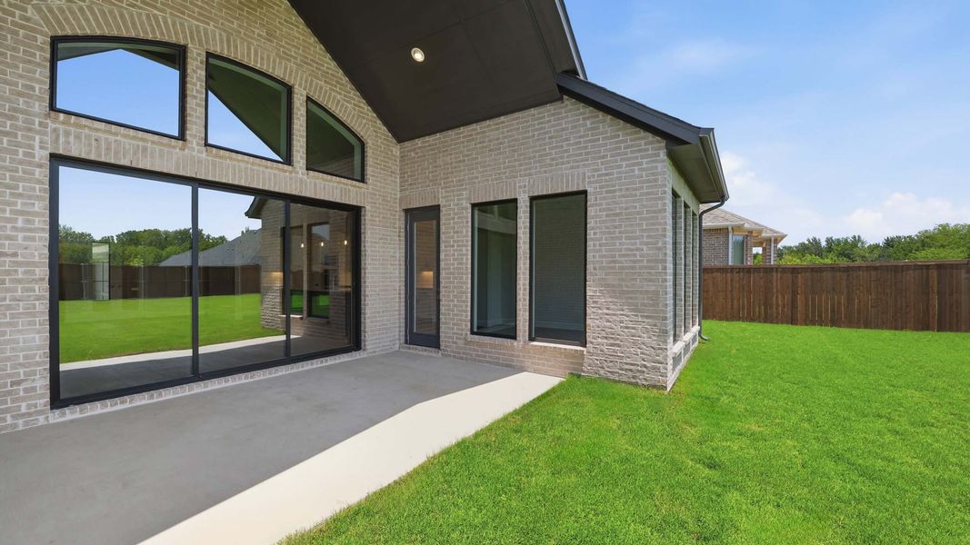 Exterior details and patio area of a home in Sonoma Verde, McLendon-Chisholm (Image 3).