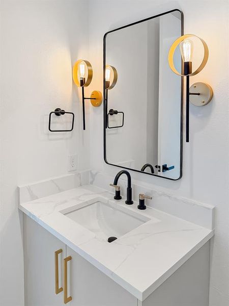Bathroom featuring vanity Bathroom featuring vanity