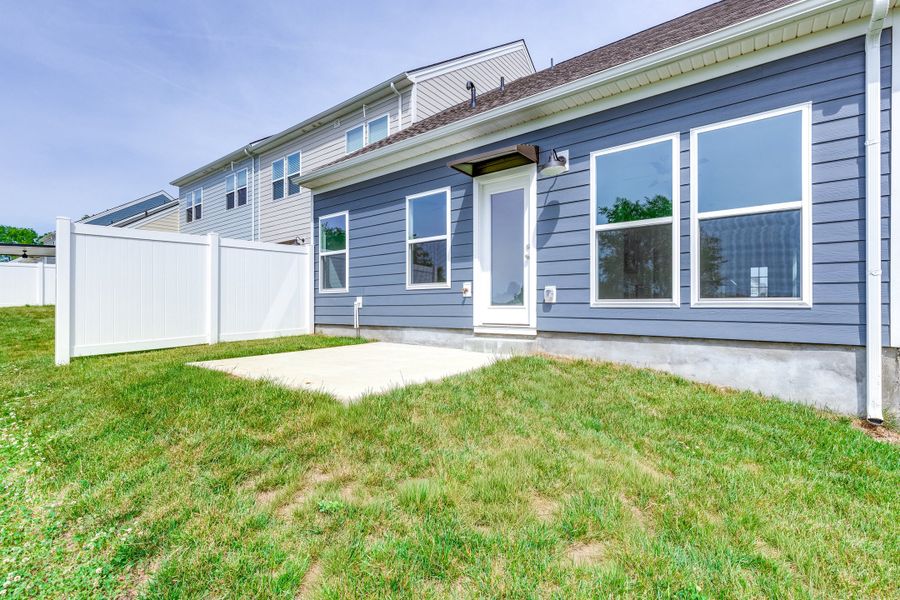Exterior details and patio area of a home in Harvest Point, Spring Hill (Image 3).