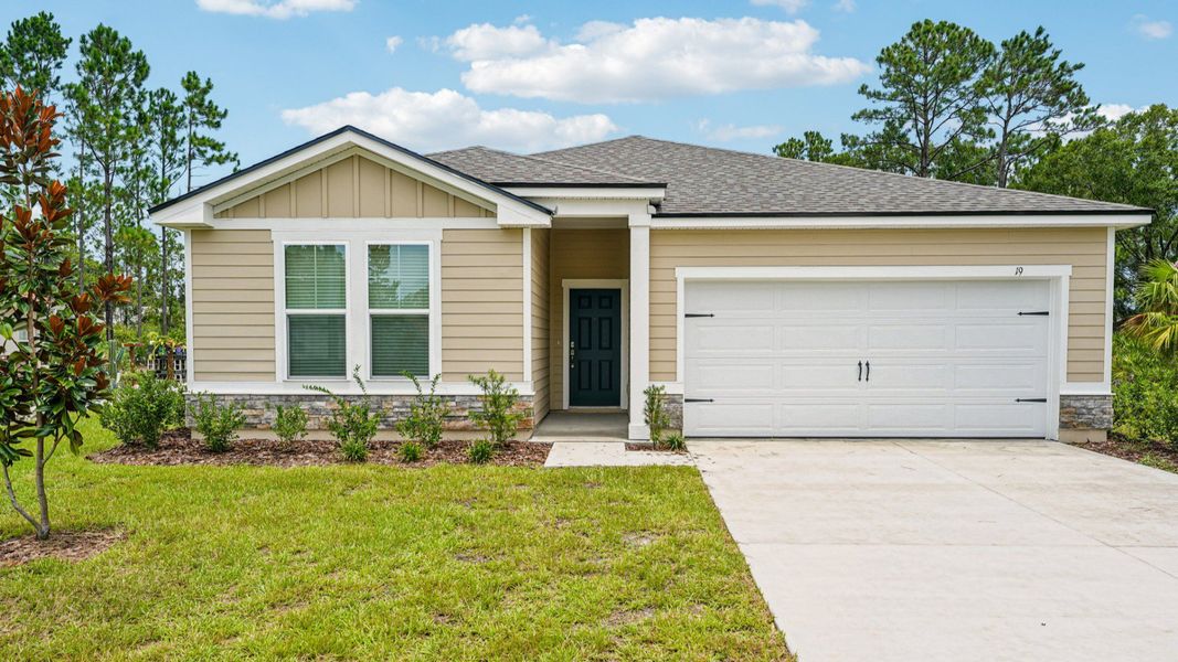 Front exterior of a new home in Palm Coast, Palm Coast, FL, highlighting curb appeal (Image 20).
