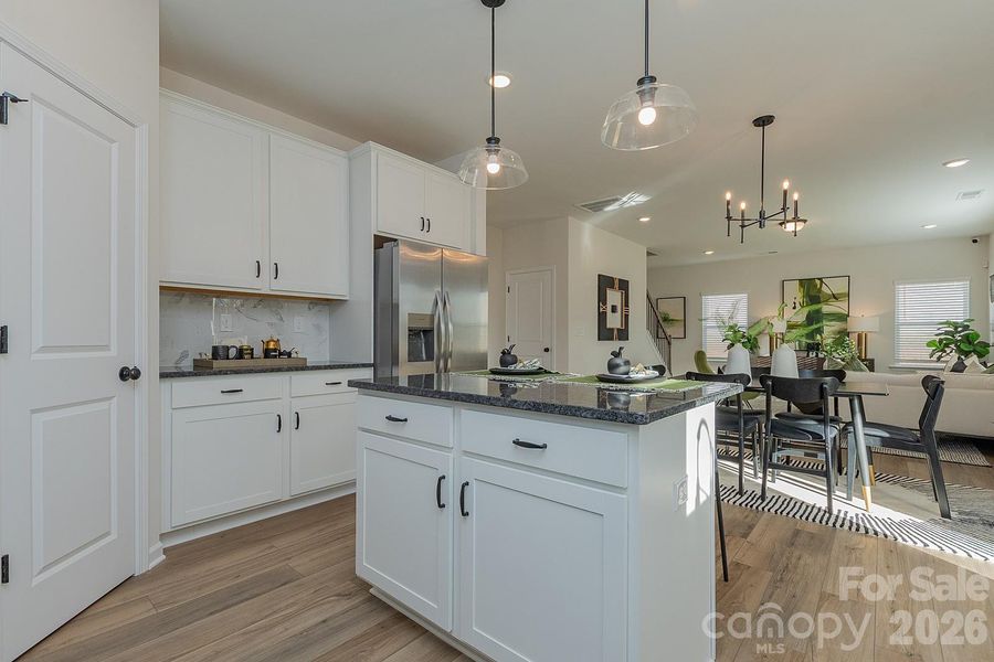 Furnished interior view inside a new home in Green Acres, Concord (Image 6).