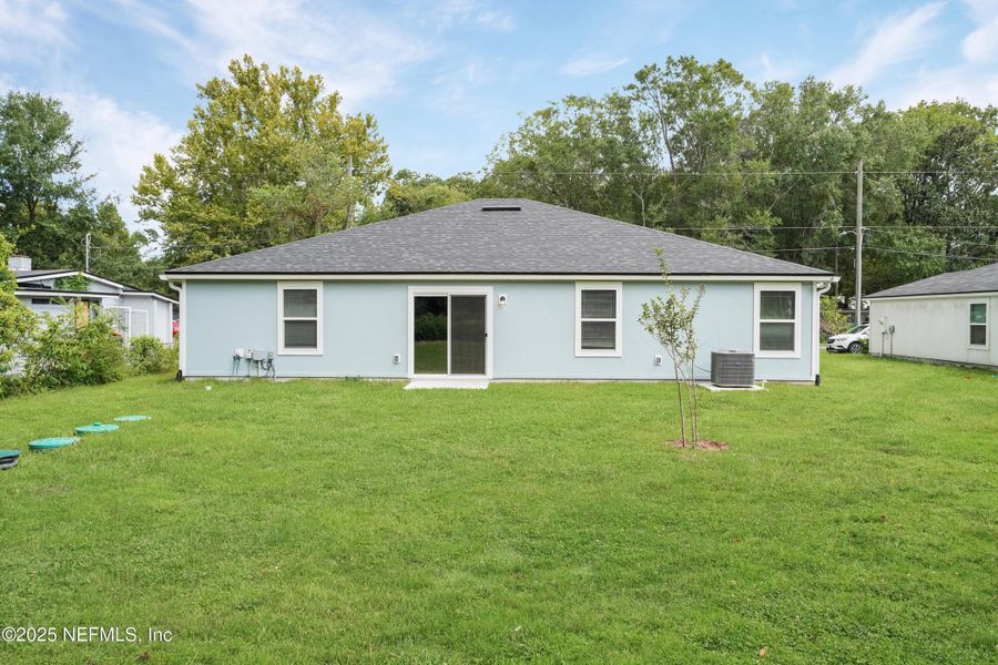 Front exterior of a new home in , Jacksonville, FL, highlighting curb appeal (Image 1).