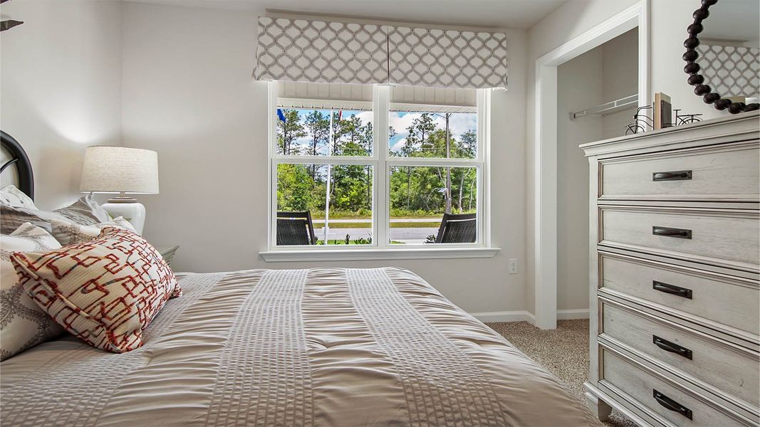 Representative furnished interior of a home built from the Cali by D.R. Horton in Owl's Head East, Freeport (Image 23).