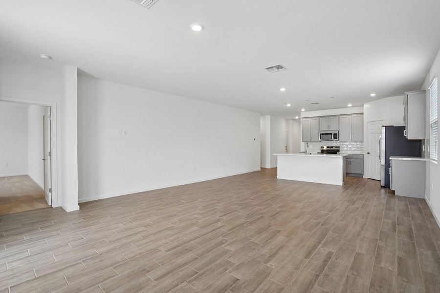 Great room, dining and kitchen