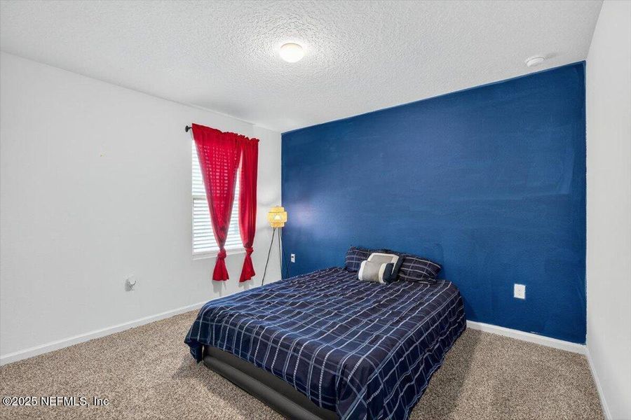 Furnished interior view inside a new home in River Glen Express, Yulee (Image 4).