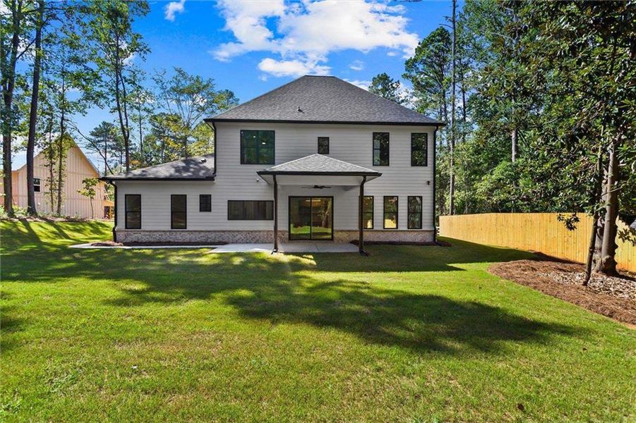 Front exterior of a new home in , Winder, GA, highlighting curb appeal (Image 33). Front exterior of a new home in , Winder, GA, highlighting curb appeal (Image 33).
