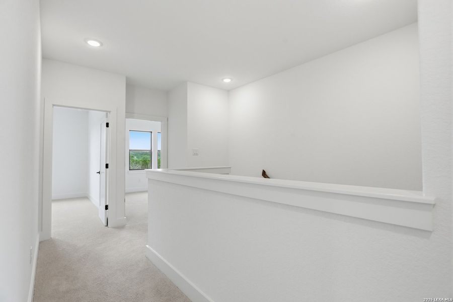Spacious, unfurnished interior of a new home in Enchanted Bluff, San Antonio (Image 25).
