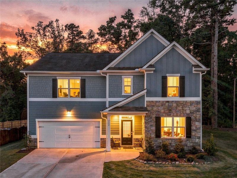 Front exterior of a new home in , Braselton, GA, highlighting curb appeal (Image 2). Front exterior of a new home in , Braselton, GA, highlighting curb appeal (Image 2).