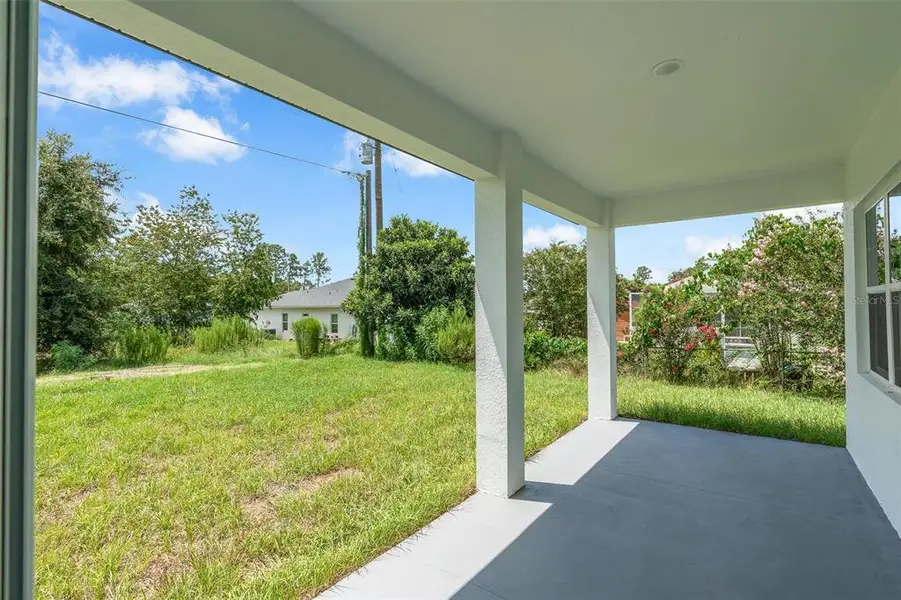 Exterior details and patio area of a home in , Ocala (Image 4).