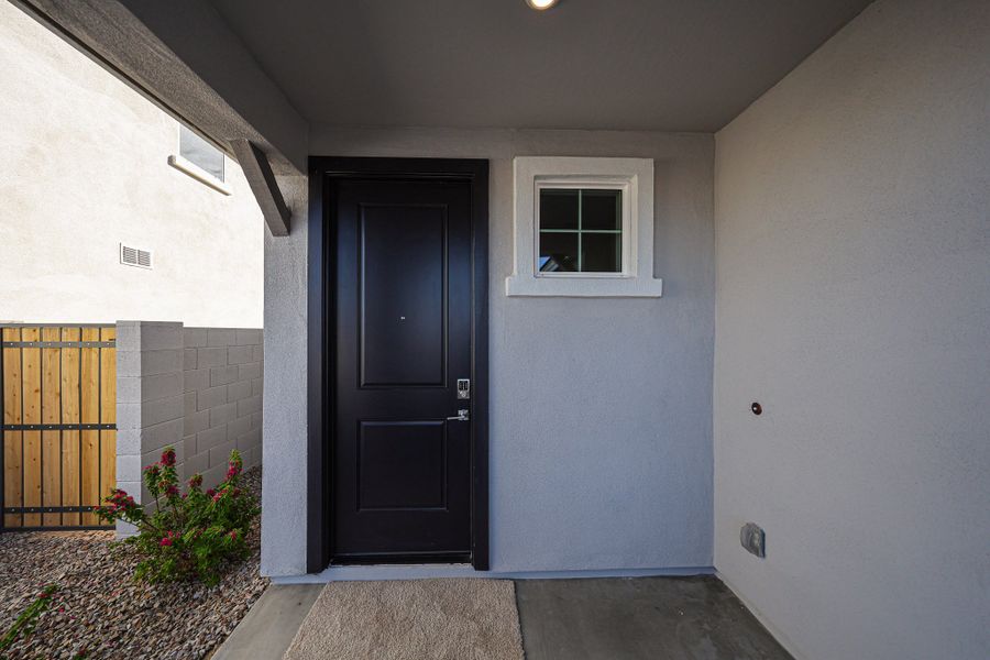 A black door in a building. A black door in a building.