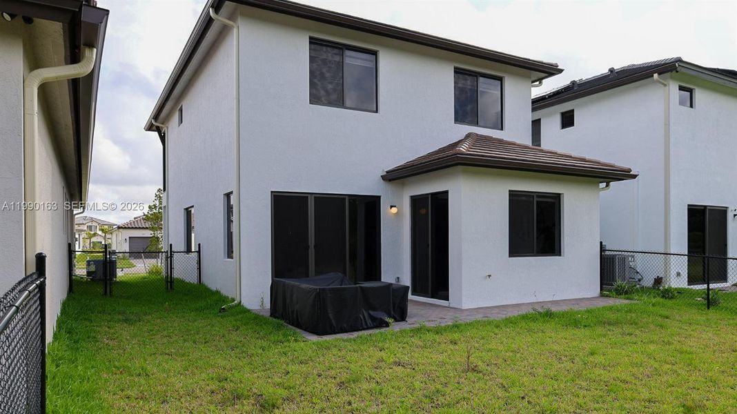 Exterior details and patio area of a home in , Ave Maria (Image 22).