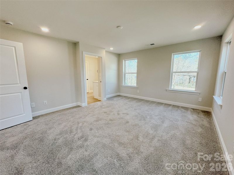 Spacious, unfurnished interior of a new home in , Huntersville (Image 29).