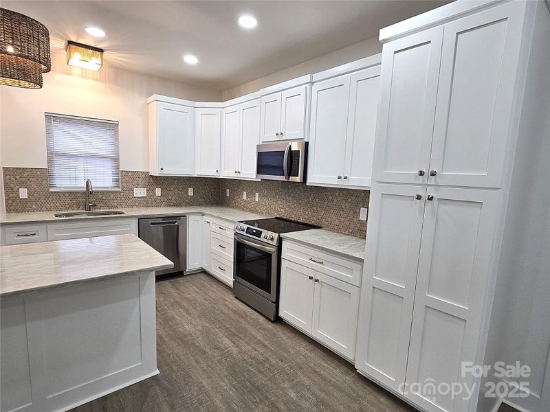Furnished interior view inside a new home in , Hickory (Image 6).