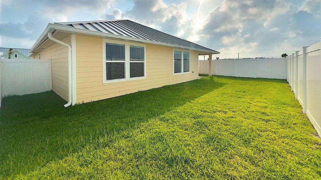 Exterior details and patio area of a home in The Islands of Rockport, Rockport (Image 16). Exterior details and patio area of a home in The Islands of Rockport, Rockport (Image 16).