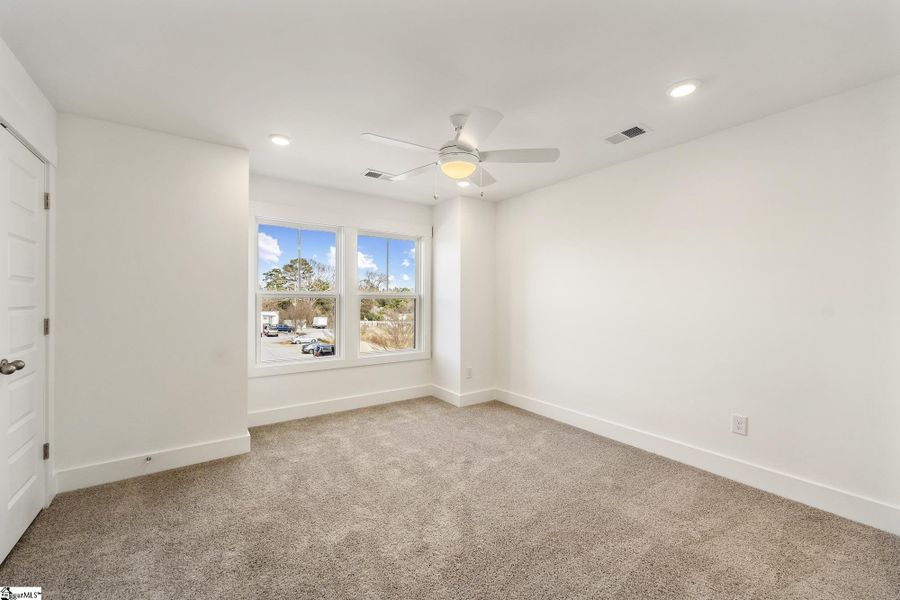 Spacious, unfurnished interior of a new home in Renaissance Place, Greenville (Image 21).