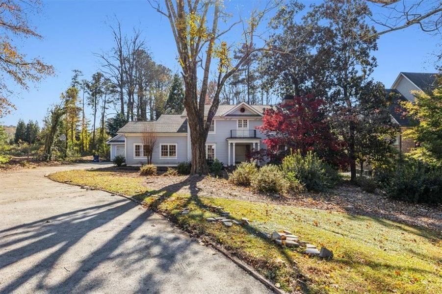 Front exterior of a new home in , Marietta, GA, highlighting curb appeal (Image 1). Front exterior of a new home in , Marietta, GA, highlighting curb appeal (Image 1).