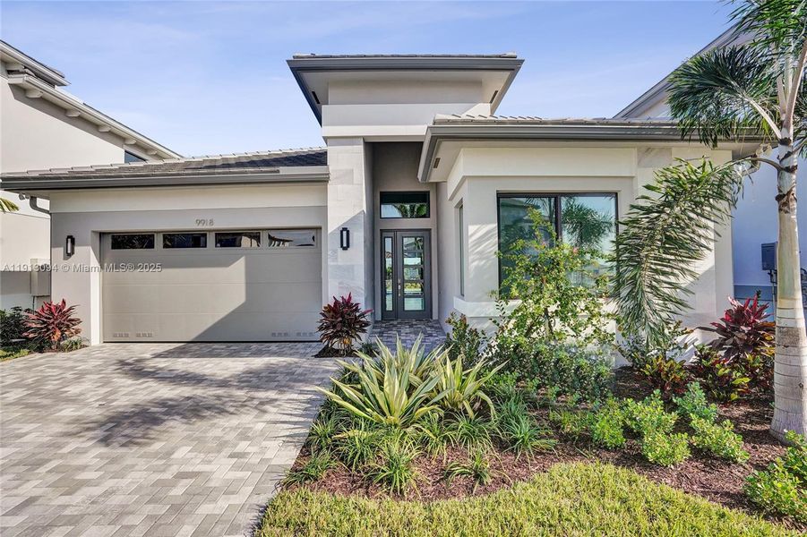 Exterior details and patio area of a home in Apex at Avenir, Palm Beach Gardens (Image 4).