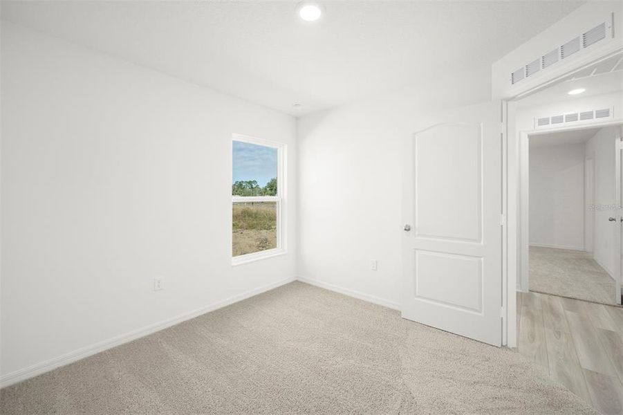 Spacious, unfurnished interior of a new home in Tula Parc, Astatula (Image 17).